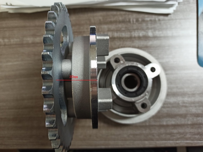 Buffer sprocket wheel assembly