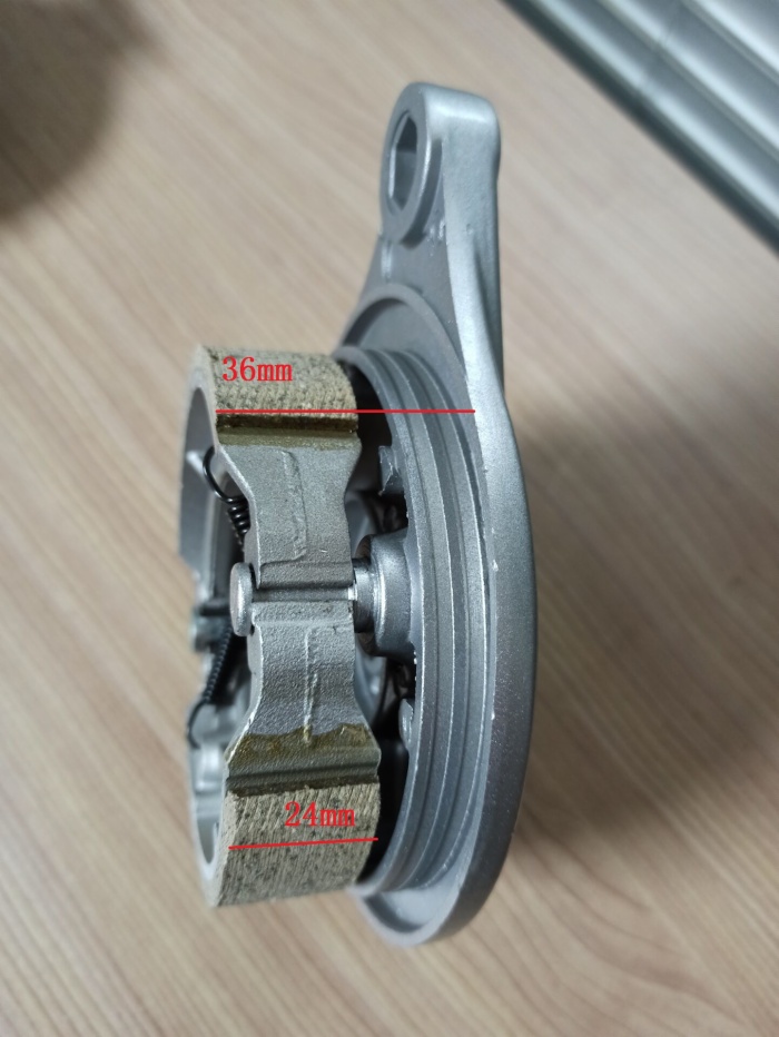 Rear panel brake assembly