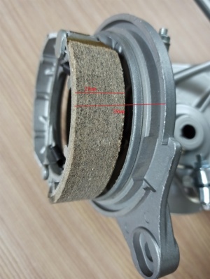 Rear panel brake assembly